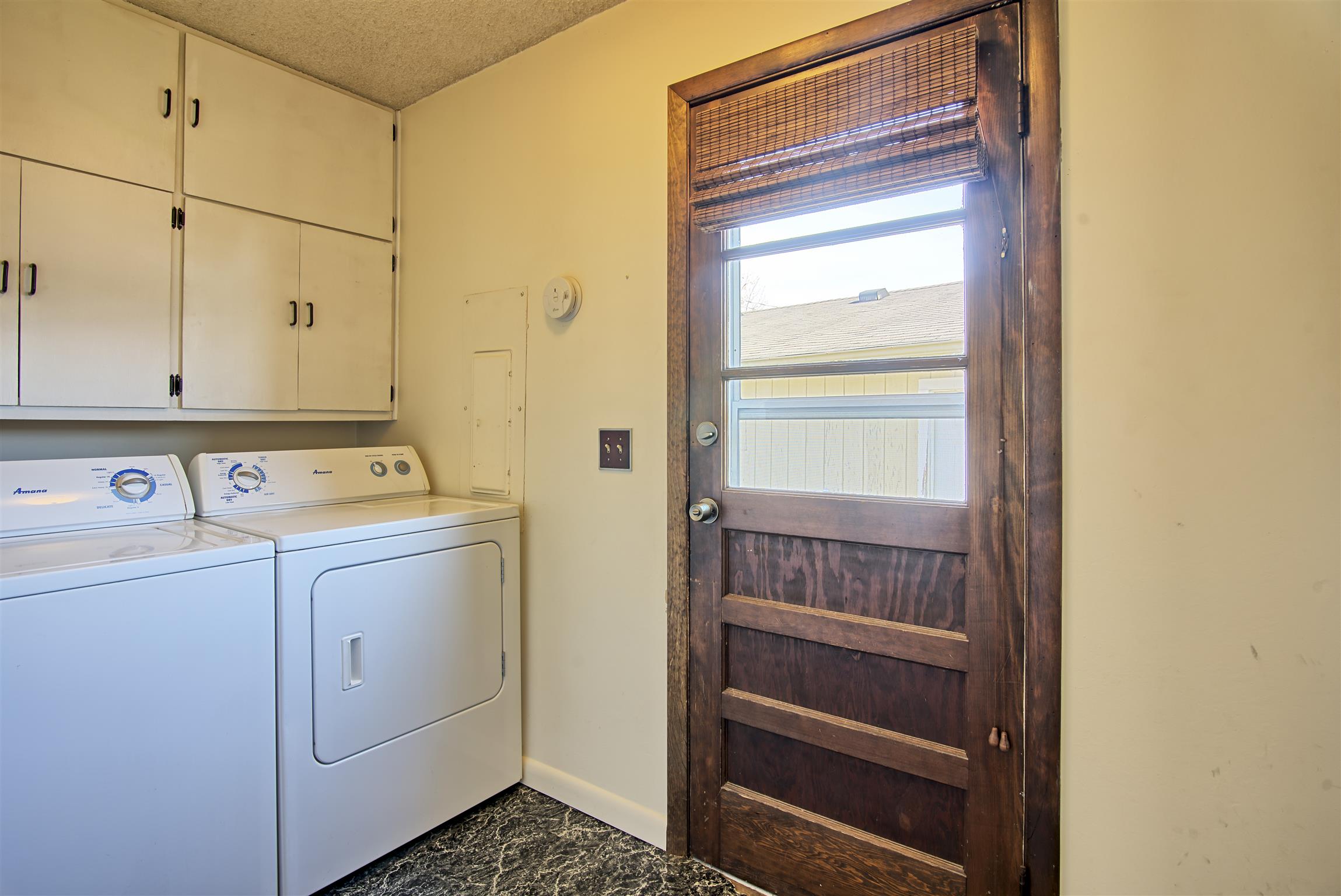 7487 Deer Ridge Road Primm Springs, TN 38476 - Photo 7 of 13 a utility room with dryer and washer