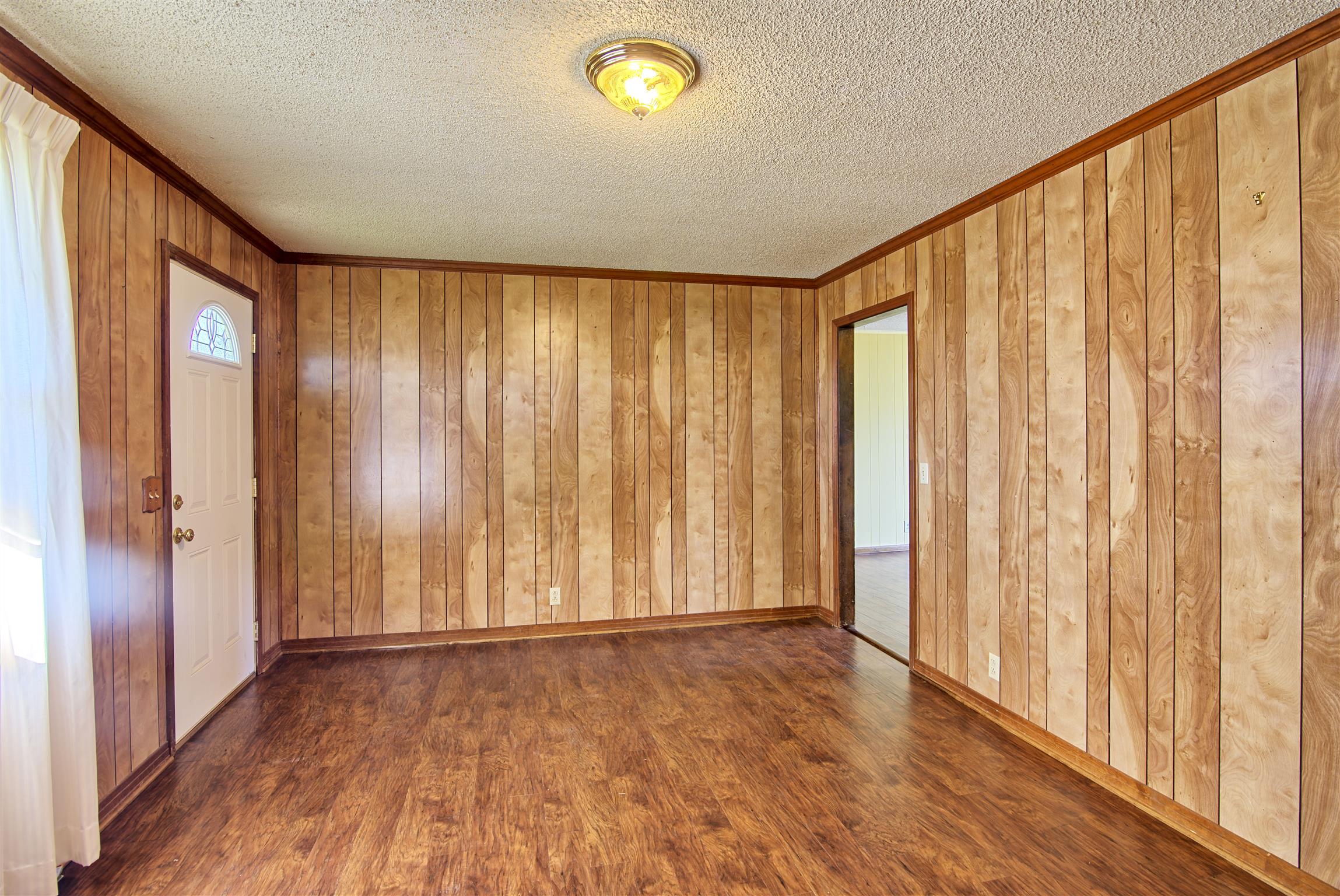 7487 Deer Ridge Road Primm Springs, TN 38476 - Photo 9 of 13 a view of a interior in a hall with a window