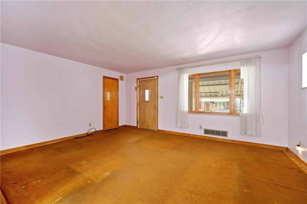 663 Loretta Street Pittsburgh, PA 15217 - Photo 12 of 17 an empty room with windows
