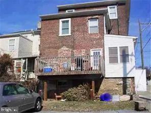 a front view of a house with a porch