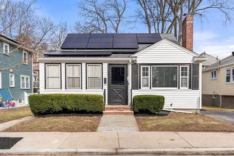 a picture of a bench in a white wall