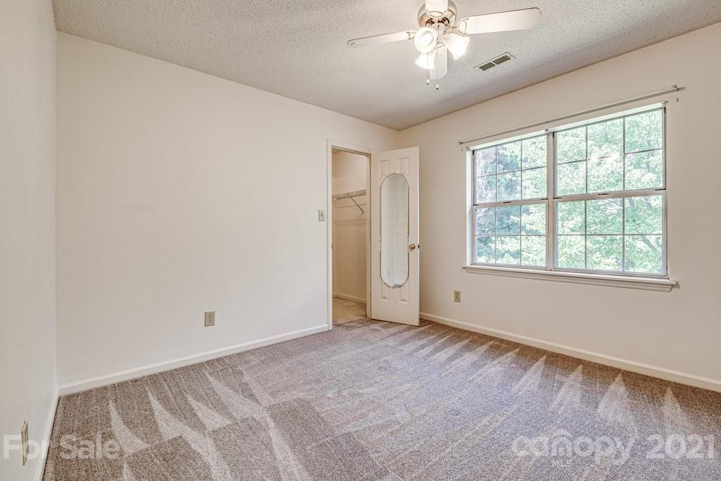 4516 Brownes Ferry Road Charlotte, NC 28269 - Photo 26 of 32 a view of an empty room with a window