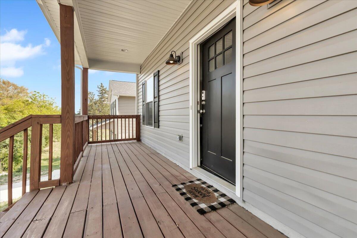 1624 24th Street Northeast Roanoke, VA 24012 - Photo 4 of 25 a view of a balcony with wooden floor