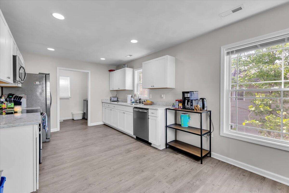 1624 24th Street Northeast Roanoke, VA 24012 - Photo 10 of 25 a kitchen with a refrigerator and a sink