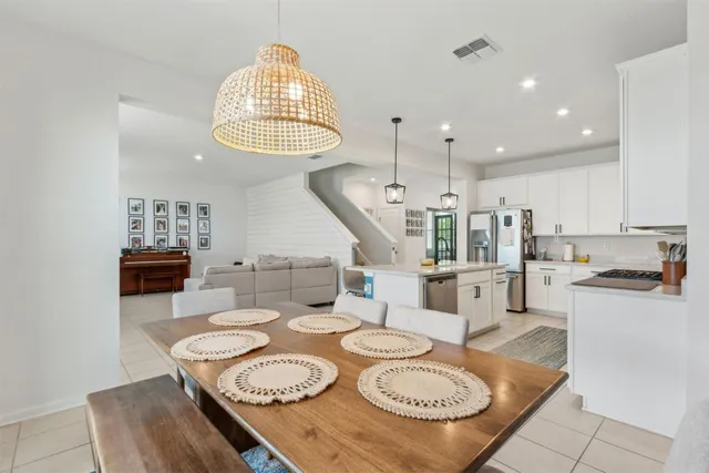 a blue bench sitting in front of a building