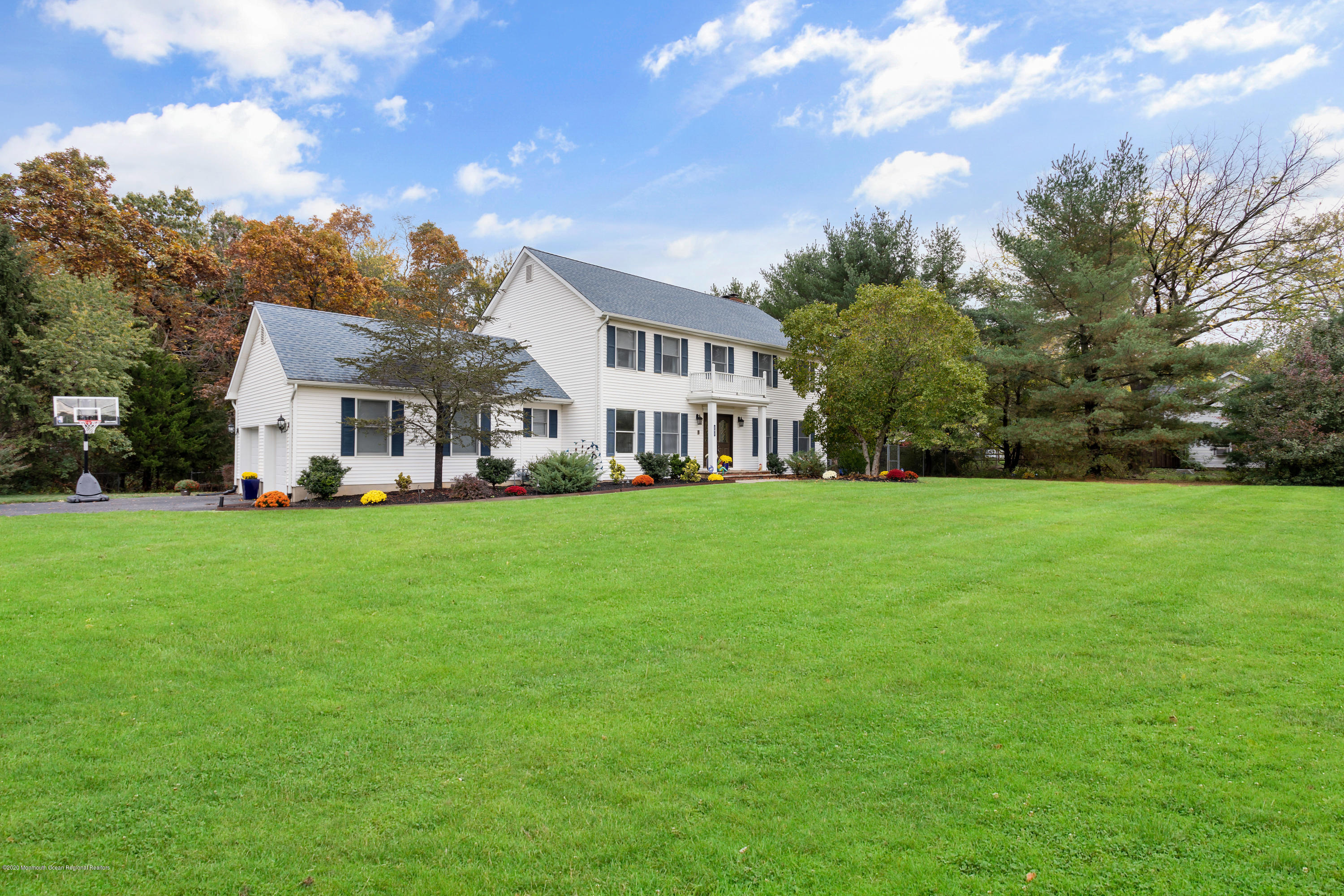 202 Adelphia Road Farmingdale, NJ 07727 - Photo 2 of 40 a front view of house with yard