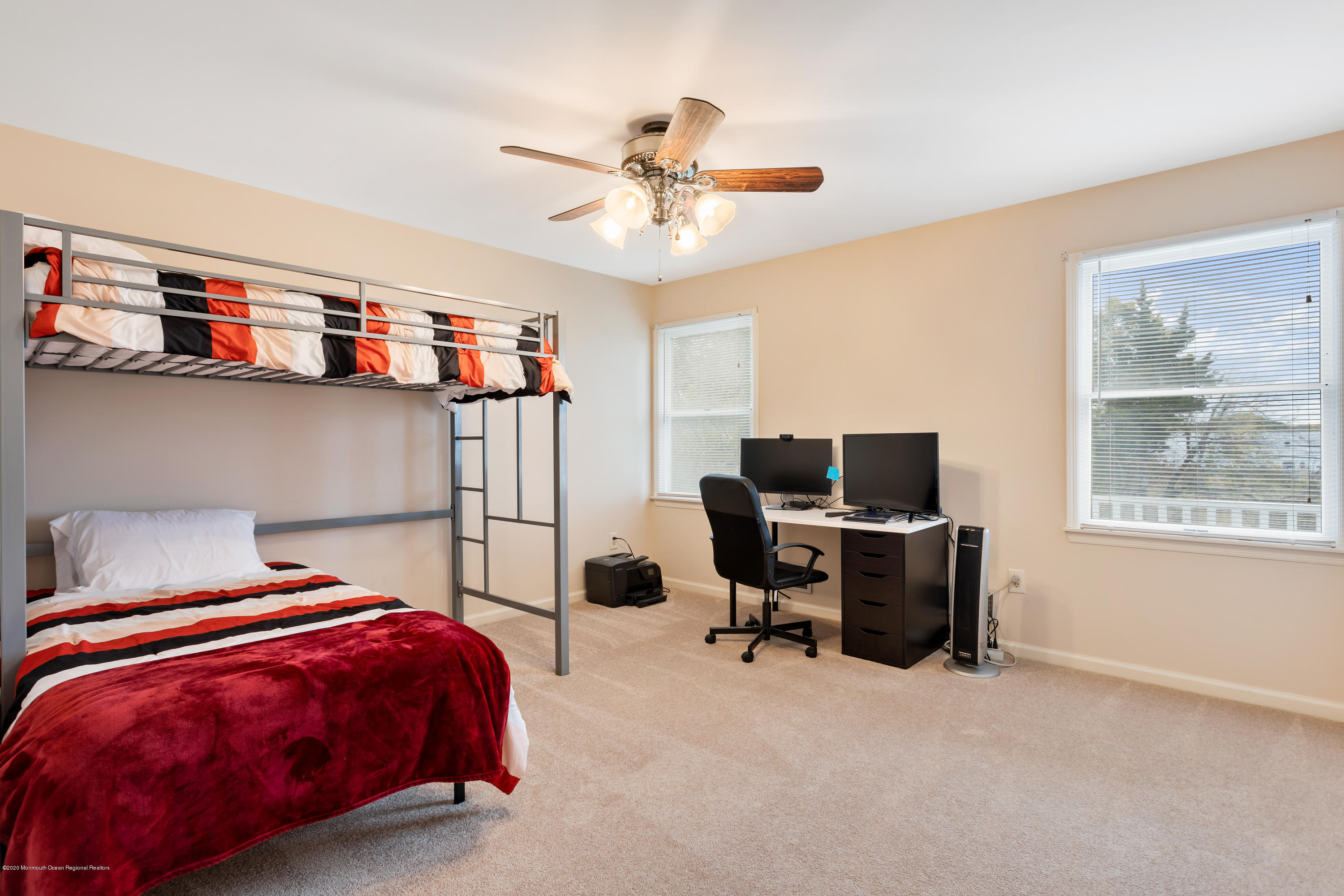 202 Adelphia Road Farmingdale, NJ 07727 - Photo 23 of 40 a bedroom with a bed and a window