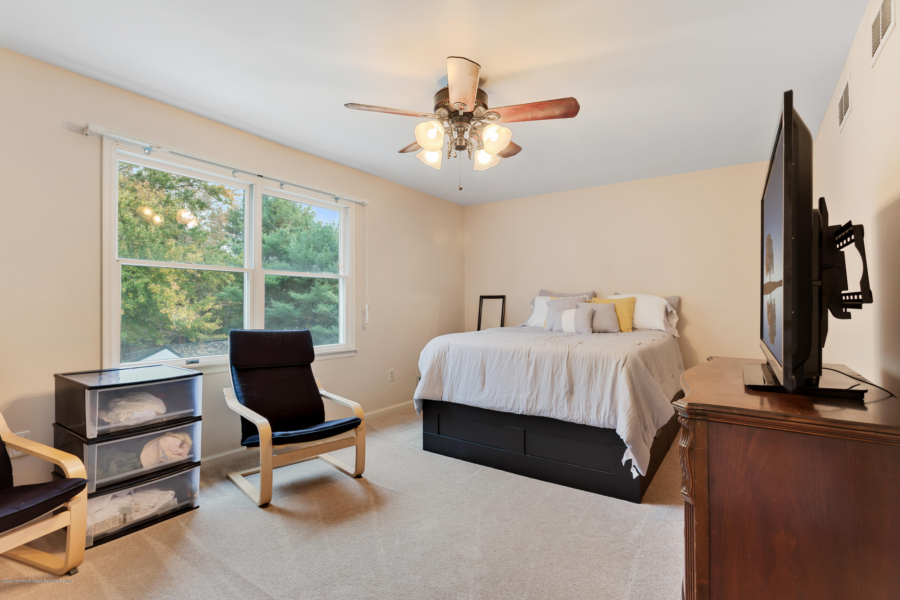 202 Adelphia Road Farmingdale, NJ 07727 - Photo 25 of 40 a bedroom with a bed tv and window