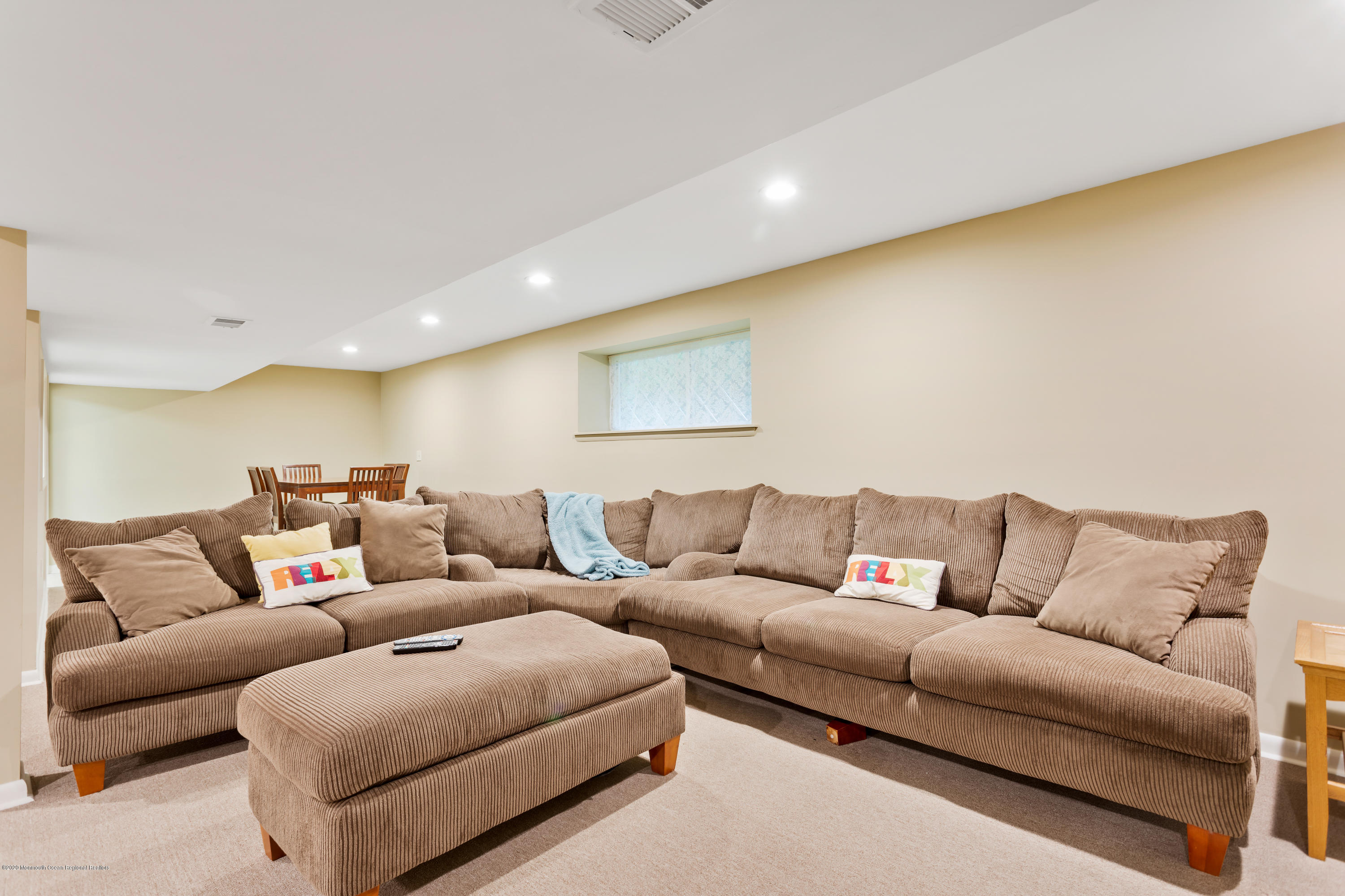 202 Adelphia Road Farmingdale, NJ 07727 - Photo 33 of 40 a living room with furniture and a couch