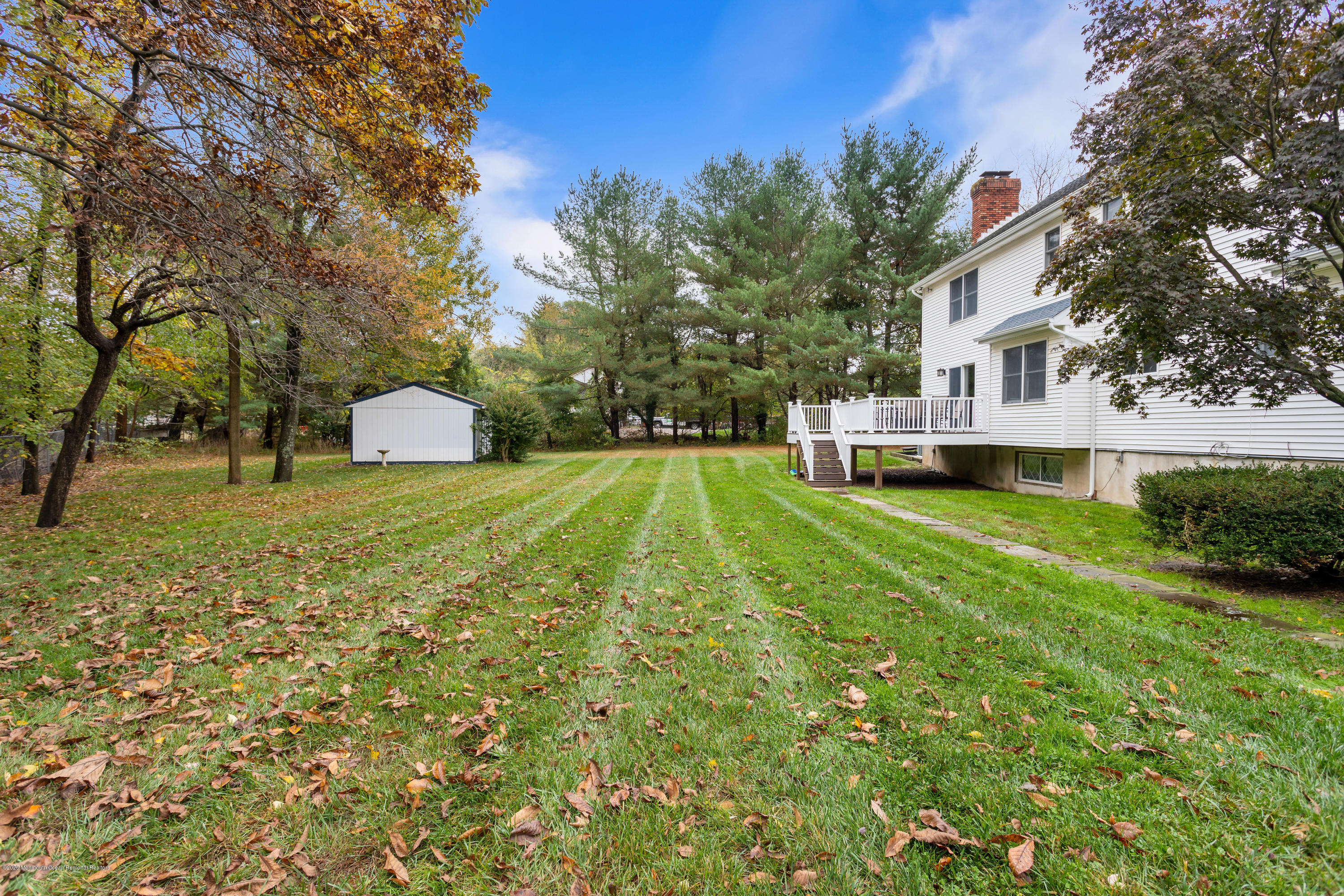 202 Adelphia Road Farmingdale, NJ 07727 - Photo 37 of 40 a view of a house with a yard