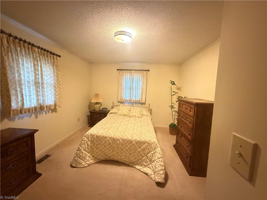 124 South Byrd Street Eden, NC 27288 - Photo 7 of 10 primary bedroom view 1