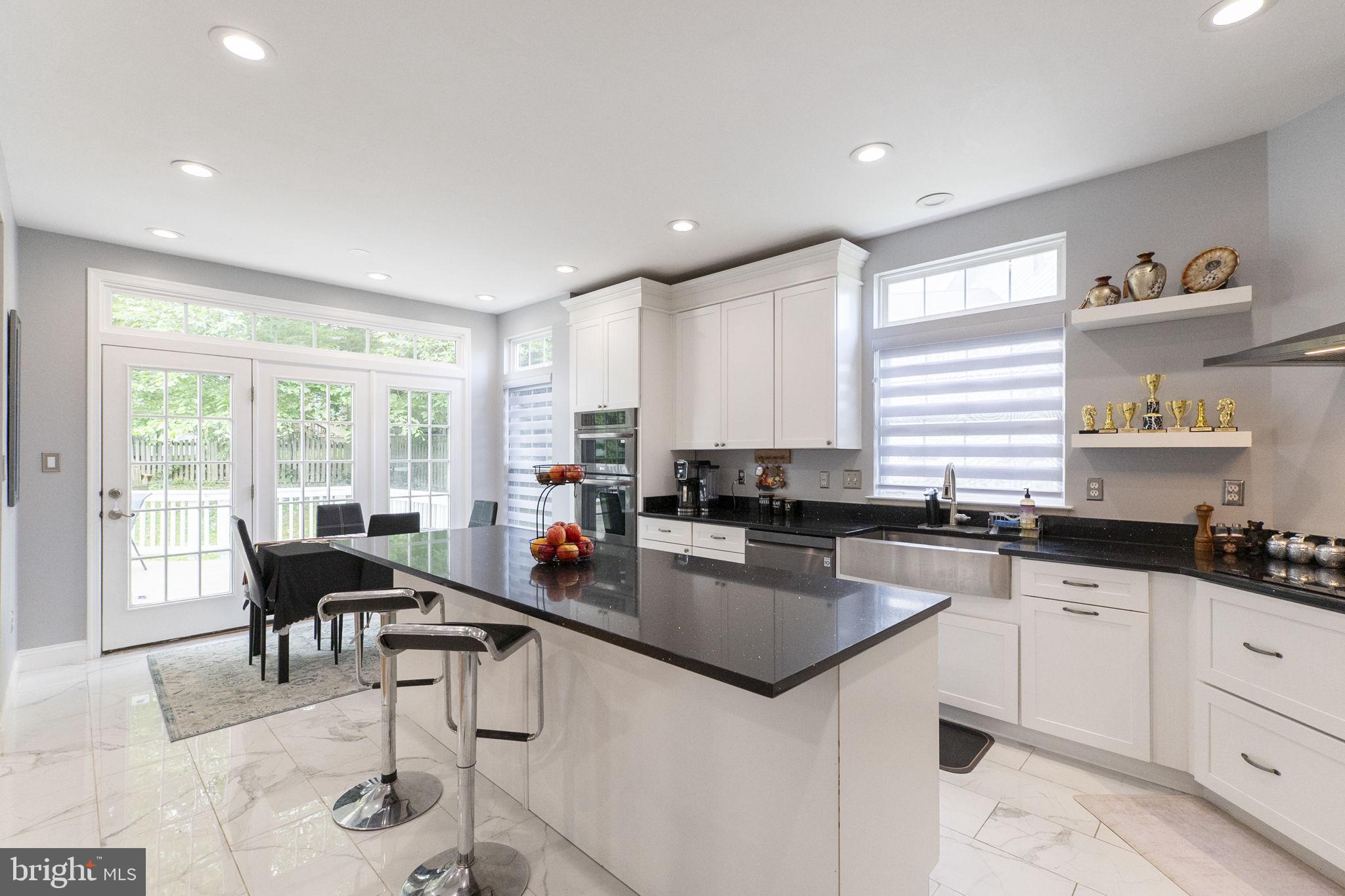 6455 Saddlebrook Lane Frederick, MD 21701 - Photo 11 of 38 a kitchen with granite countertop lots of counter top space