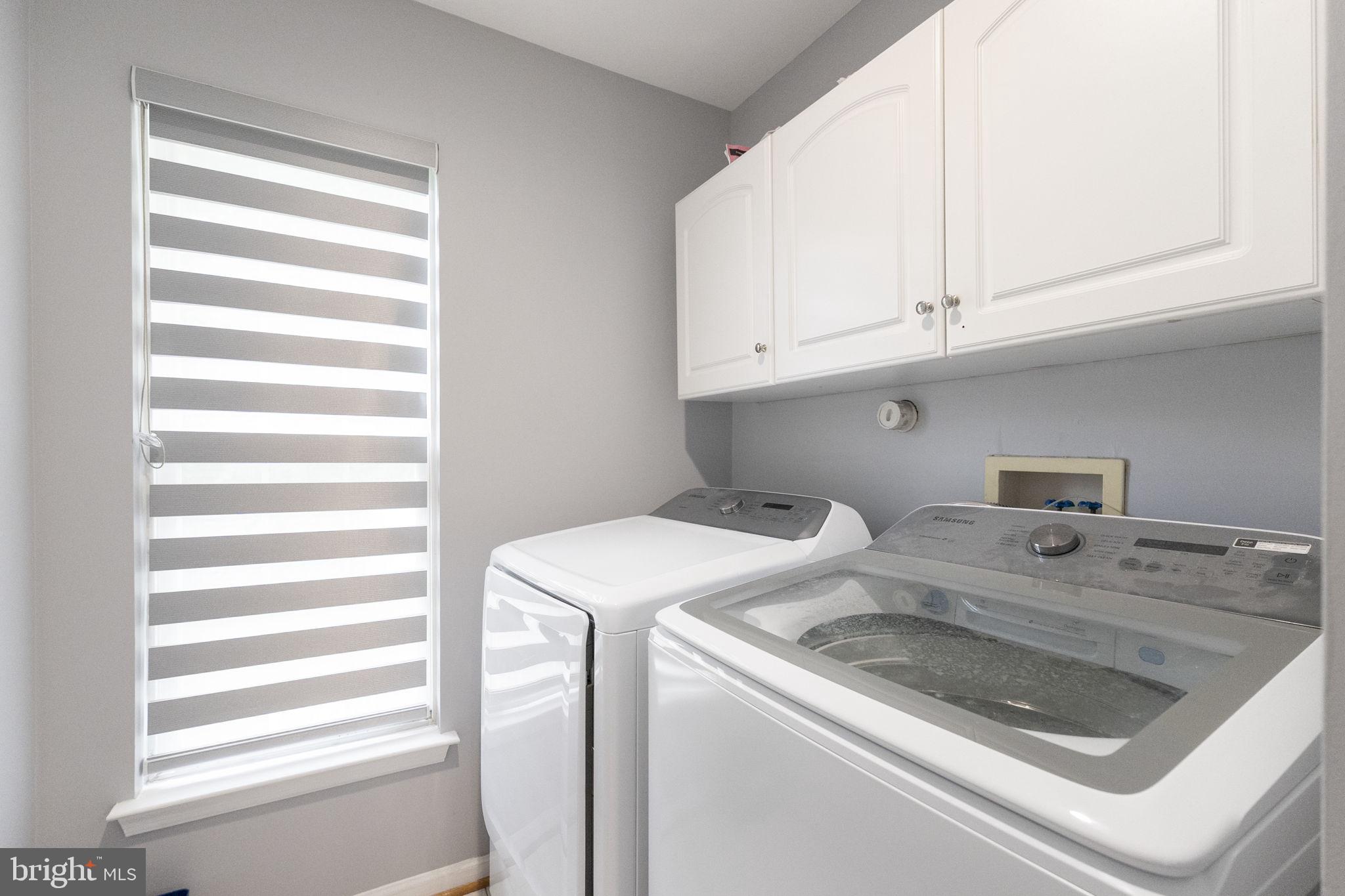 6455 Saddlebrook Lane Frederick, MD 21701 - Photo 17 of 38 a utility room with dryer and washer