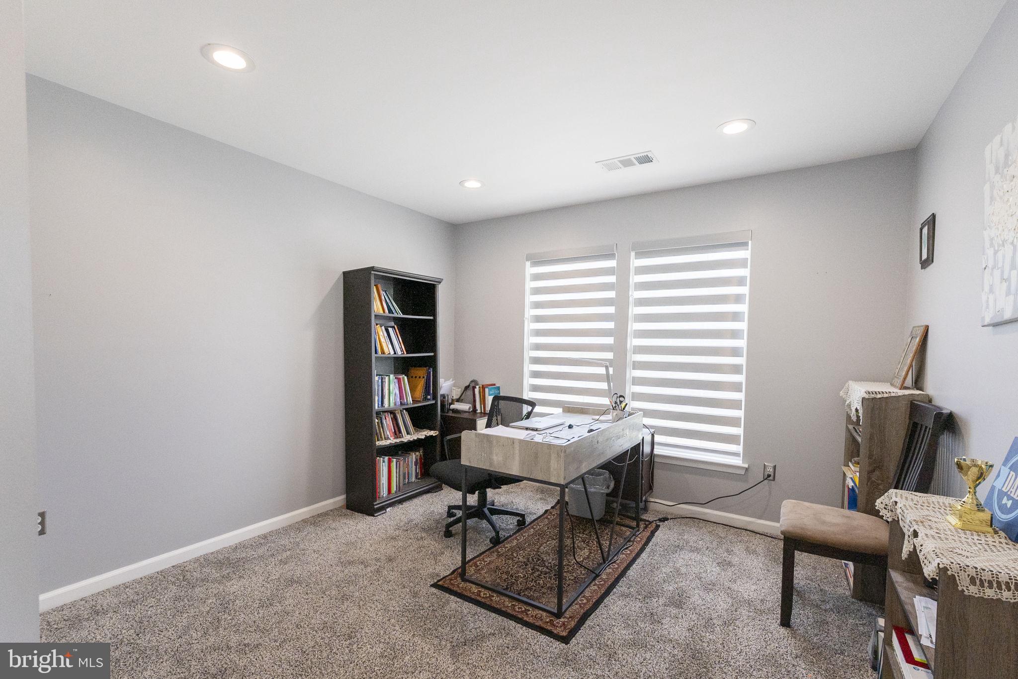 6455 Saddlebrook Lane Frederick, MD 21701 - Photo 18 of 38 a workspace with furniture and a window