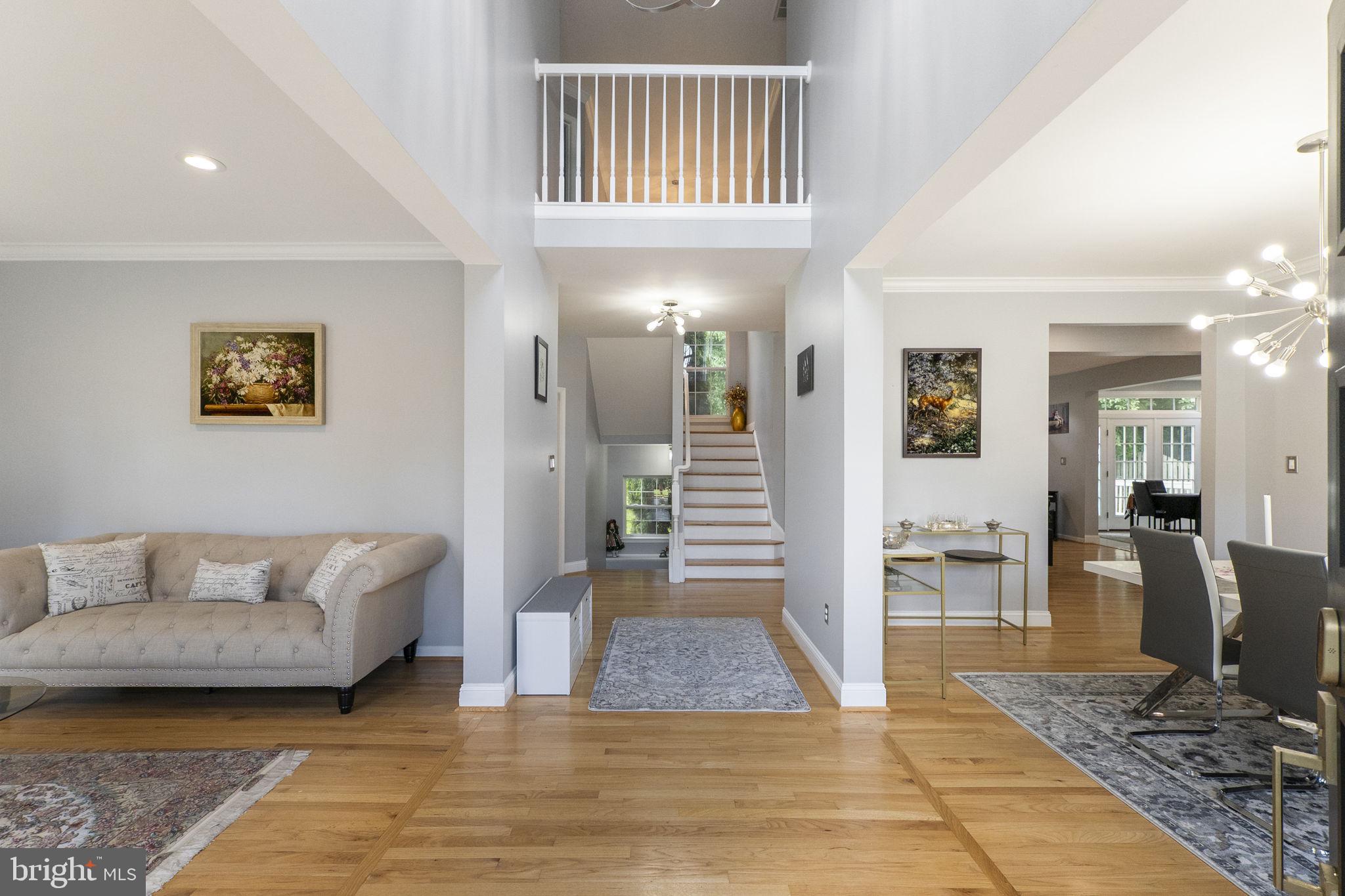 6455 Saddlebrook Lane Frederick, MD 21701 - Photo 2 of 38 a view of a livingroom with furniture and front door