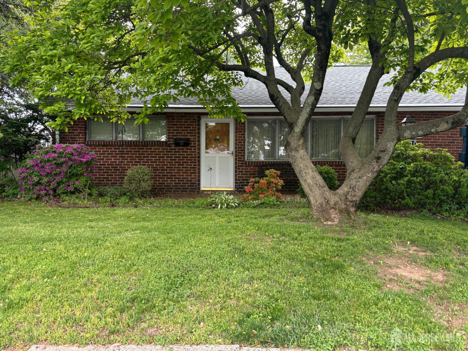 10 Miko Road Edison, NJ 08817 - Photo 1 of 3 a view of a house with backyard and garden