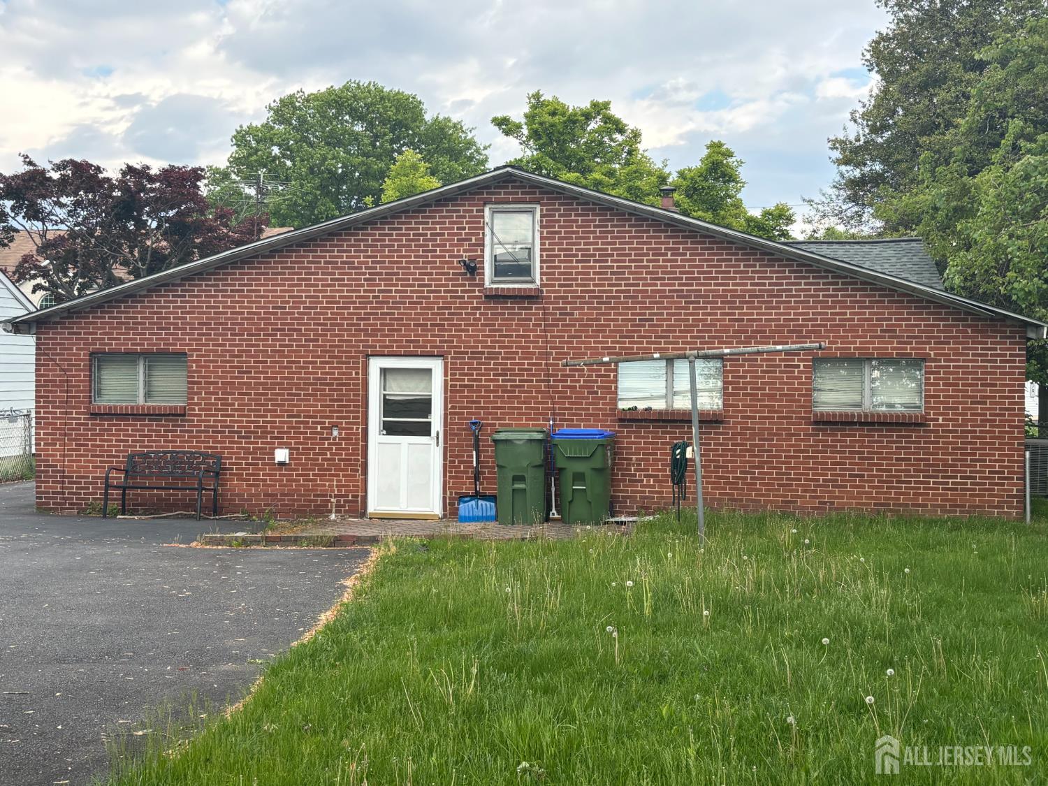 10 Miko Road Edison, NJ 08817 - Photo 2 of 3 front view of a house with a yard