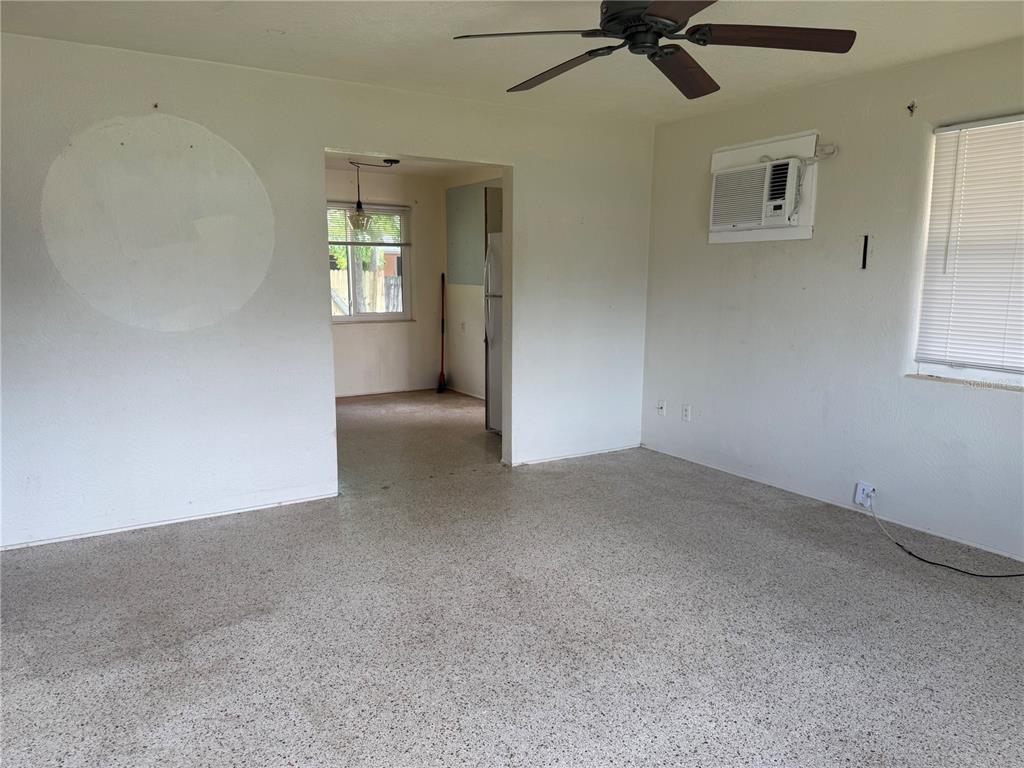 113 Neptune Drive Edgewater, FL 32132 - Photo 5 of 24 wooden floor and windows in a room