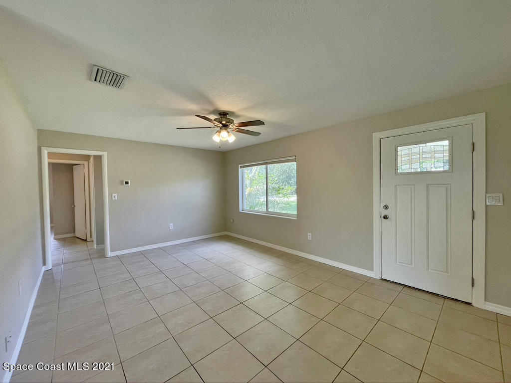 304 3rd Street Merritt Island, FL 32953 - Photo 6 of 20 Living Room 1