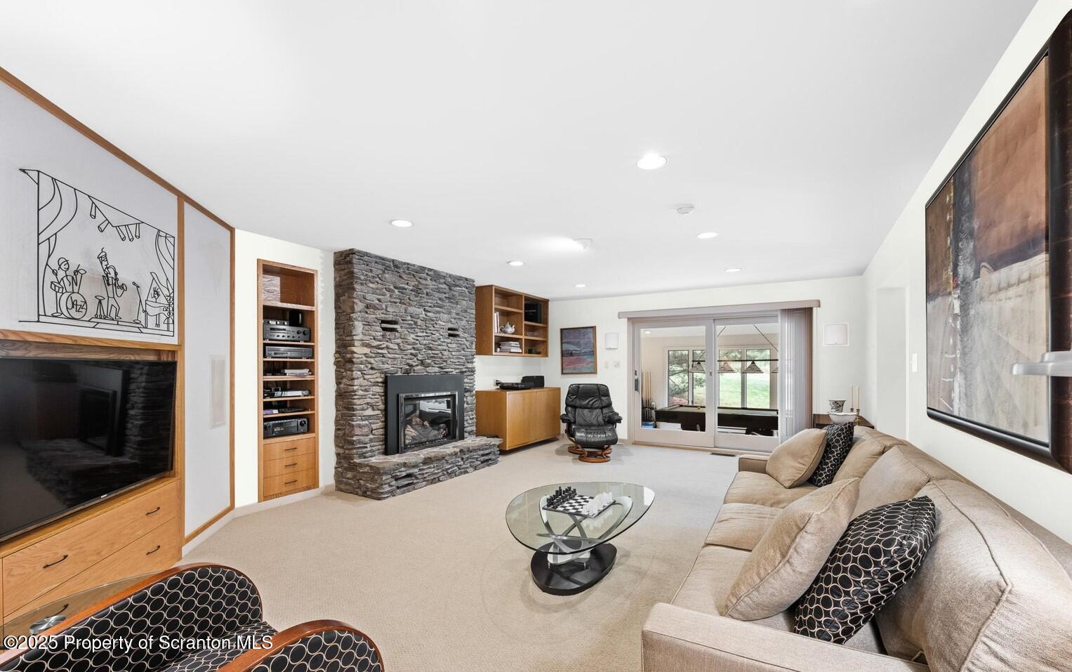 325 T-718 Shavertown, PA 18708 - Photo 15 of 41 a living room with furniture and a fireplace