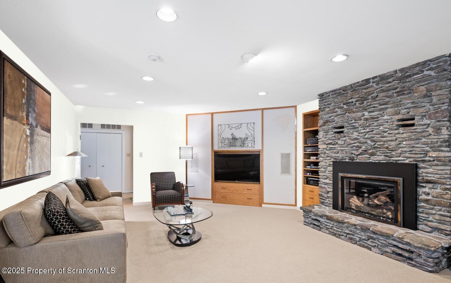 325 T-718 Shavertown, PA 18708 - Photo 16 of 41 a living room with furniture and a fireplace