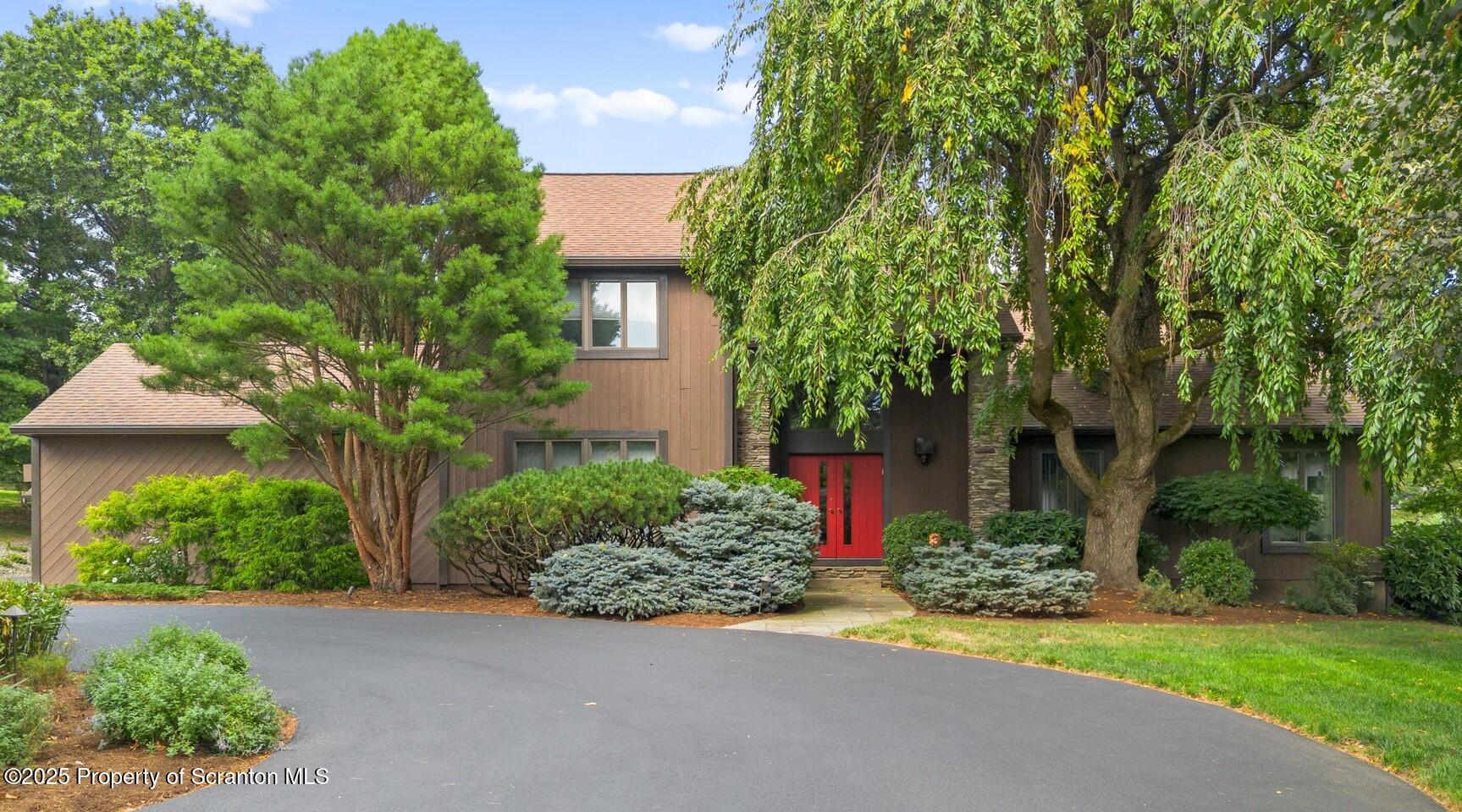 325 T-718 Shavertown, PA 18708 - Photo 2 of 41 a front view of a house with garden