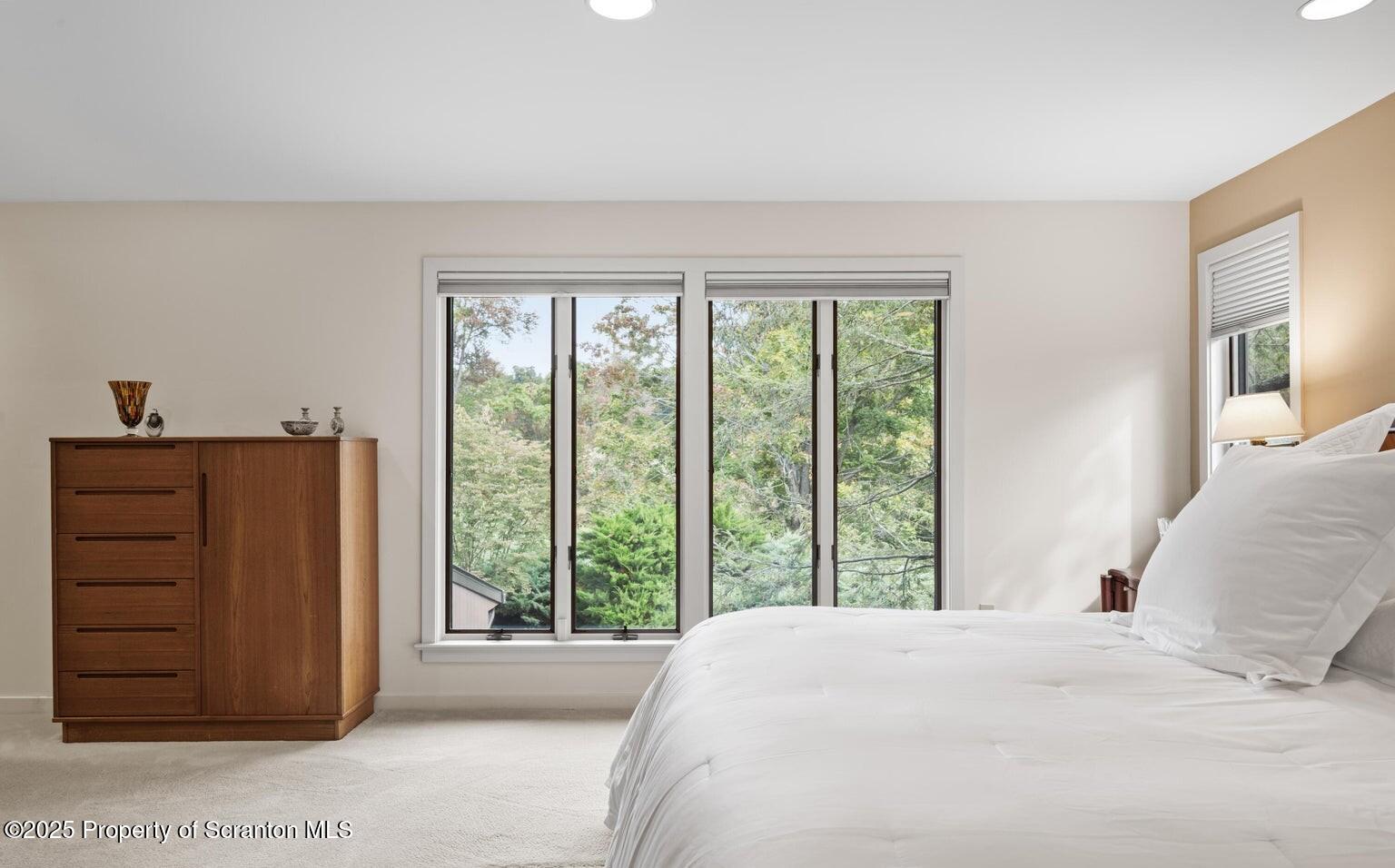 325 T-718 Shavertown, PA 18708 - Photo 23 of 41 a bedroom with a bed and a dresser