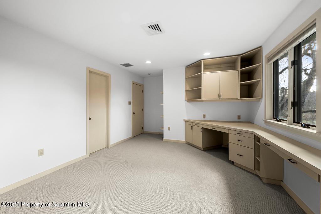 325 T-718 Shavertown, PA 18708 - Photo 30 of 41 a large white kitchen with stainless steel appliances granite countertop a sink and cabinets with wooden floor
