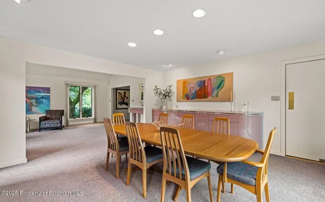 a view of a dining room with furniture