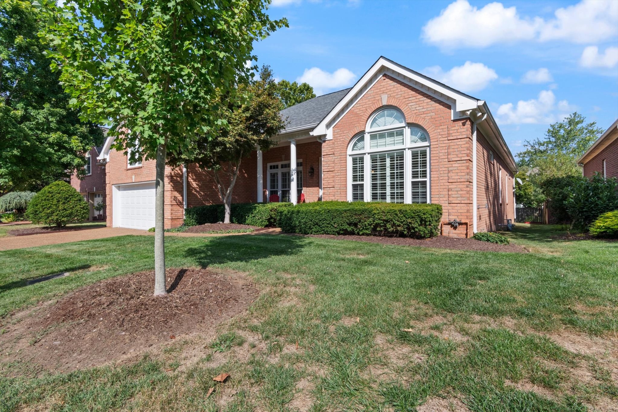 272 Noah Drive Franklin, TN 37064 - Photo 2 of 35 a front view of a house with a yard and garage