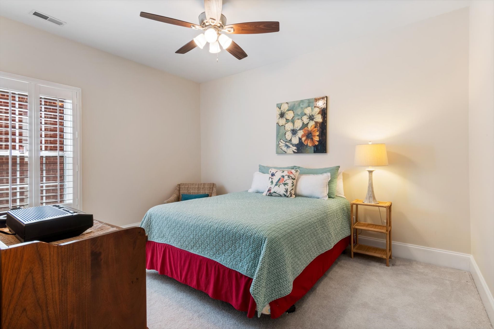 272 Noah Drive Franklin, TN 37064 - Photo 24 of 35 a bedroom with a bed and a chandelier