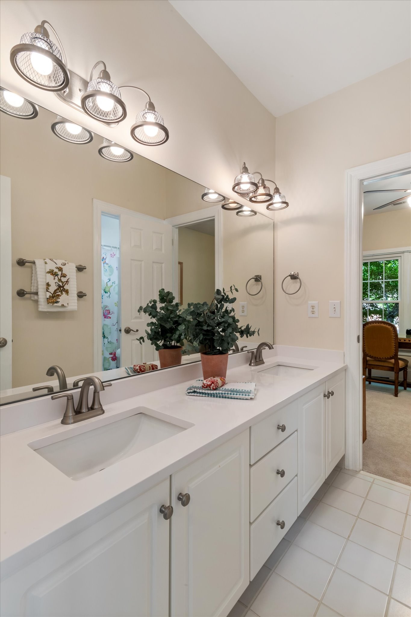 272 Noah Drive Franklin, TN 37064 - Photo 29 of 35 a bathroom with a sink and a mirror