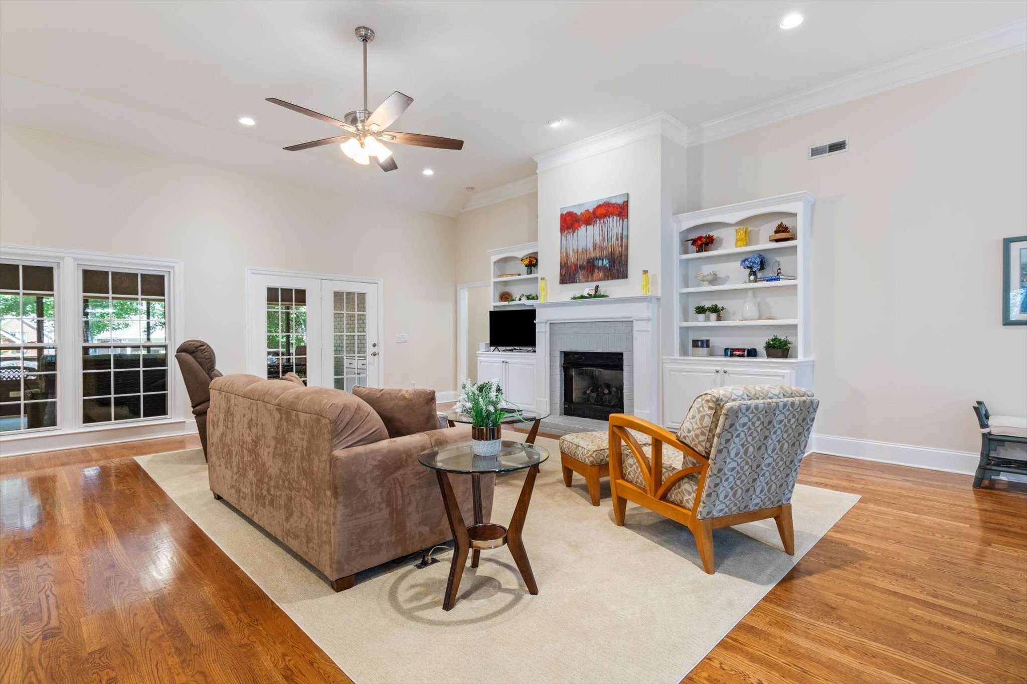 272 Noah Drive Franklin, TN 37064 - Photo 10 of 35 a living room with furniture and a fireplace