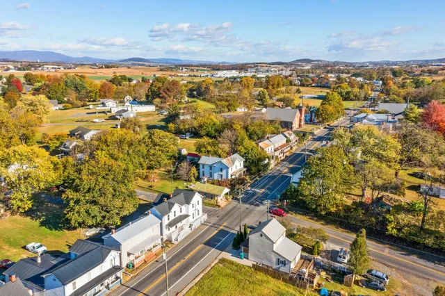 a view of a white building among the street