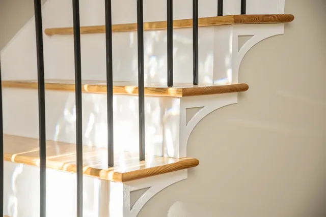 a view of staircase with open door