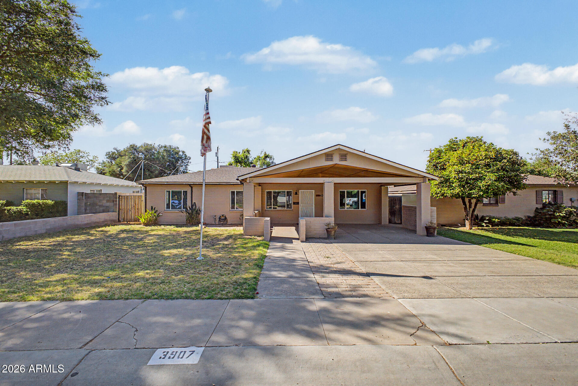 3907 East Mulberry Drive Phoenix, AZ 85018 - Photo 1 of 48 a front view of a house with a yard