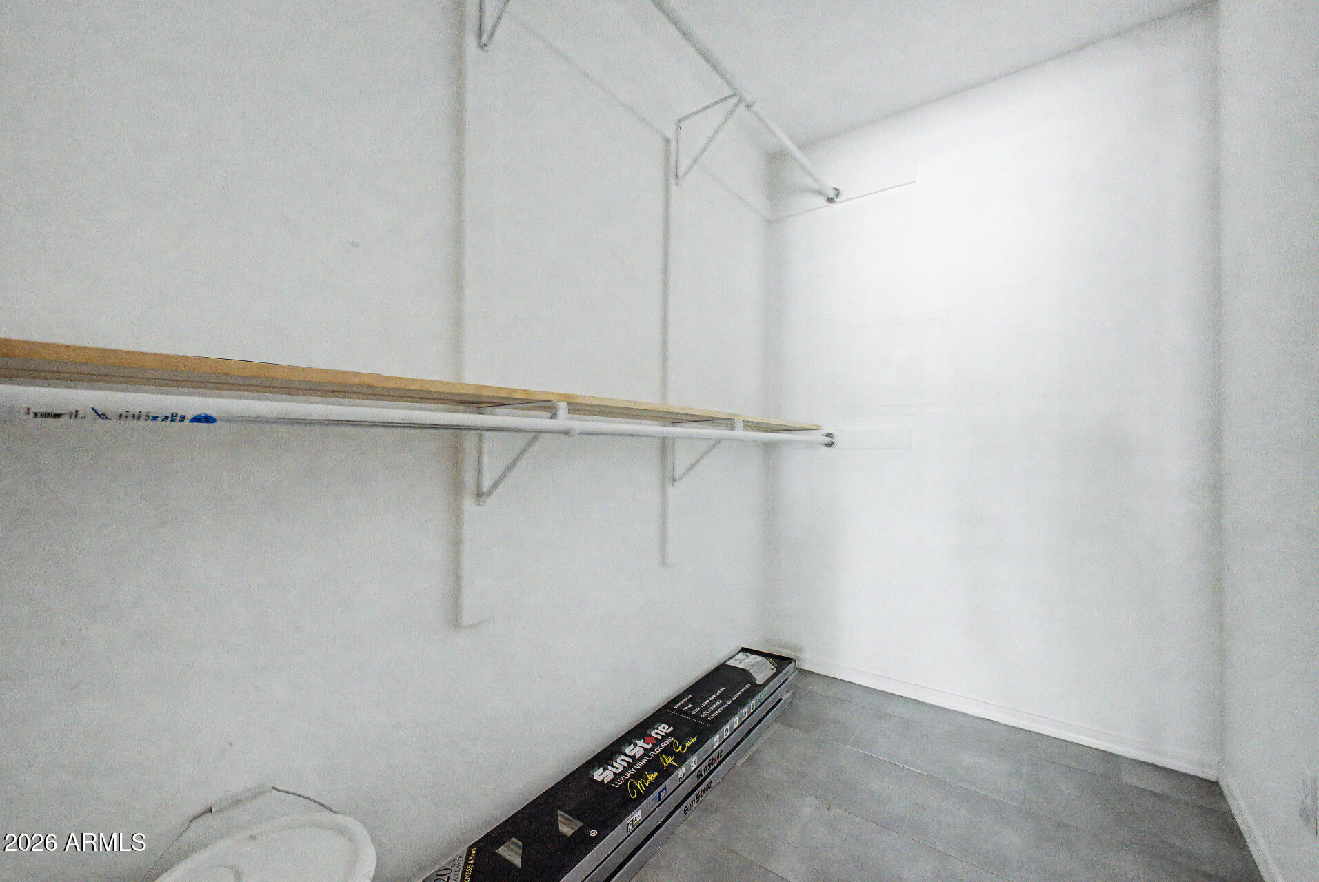 3907 East Mulberry Drive Phoenix, AZ 85018 - Photo 18 of 48 a view of a room with racks on the wall