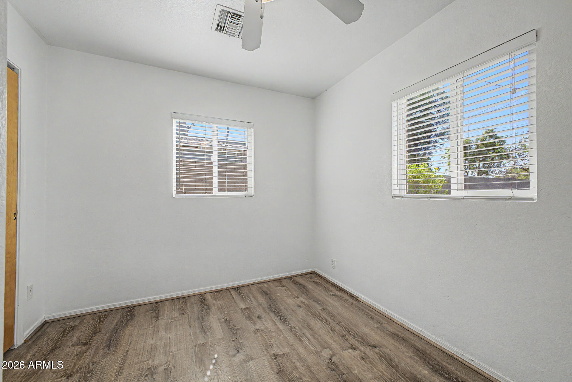 3907 East Mulberry Drive Phoenix, AZ 85018 - Photo 19 of 48 an empty room with a window