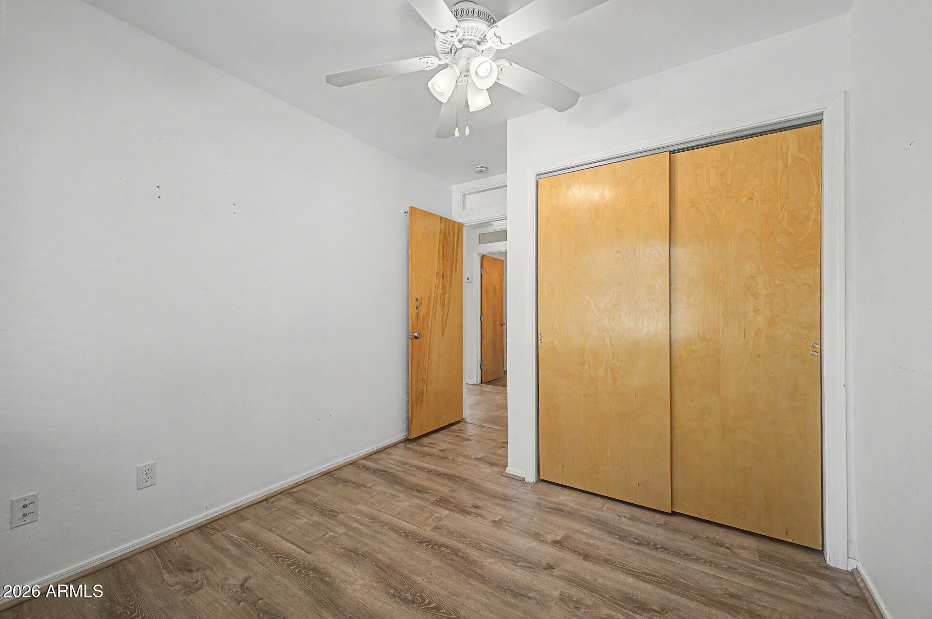 3907 East Mulberry Drive Phoenix, AZ 85018 - Photo 24 of 48 a view of an empty room with window chandelier fan