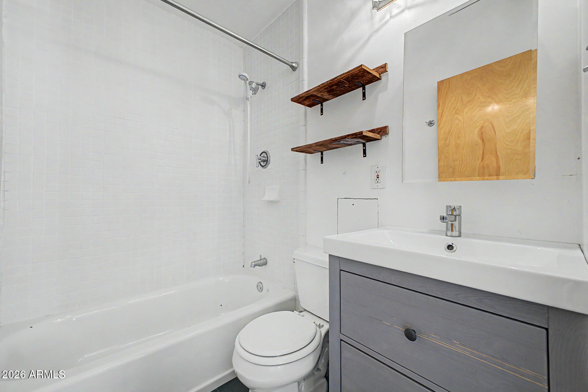 3907 East Mulberry Drive Phoenix, AZ 85018 - Photo 25 of 48 a bathroom with a sink a toilet and shower