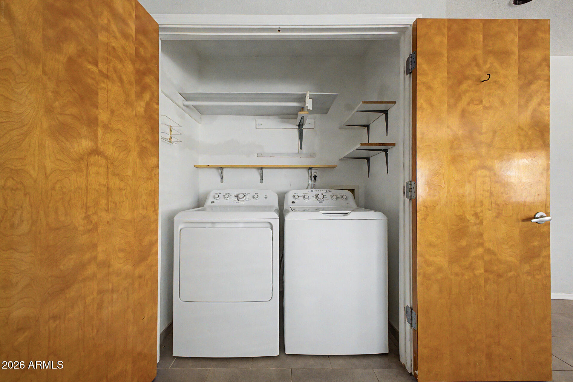 3907 East Mulberry Drive Phoenix, AZ 85018 - Photo 26 of 48 a utility room with dryer and washer