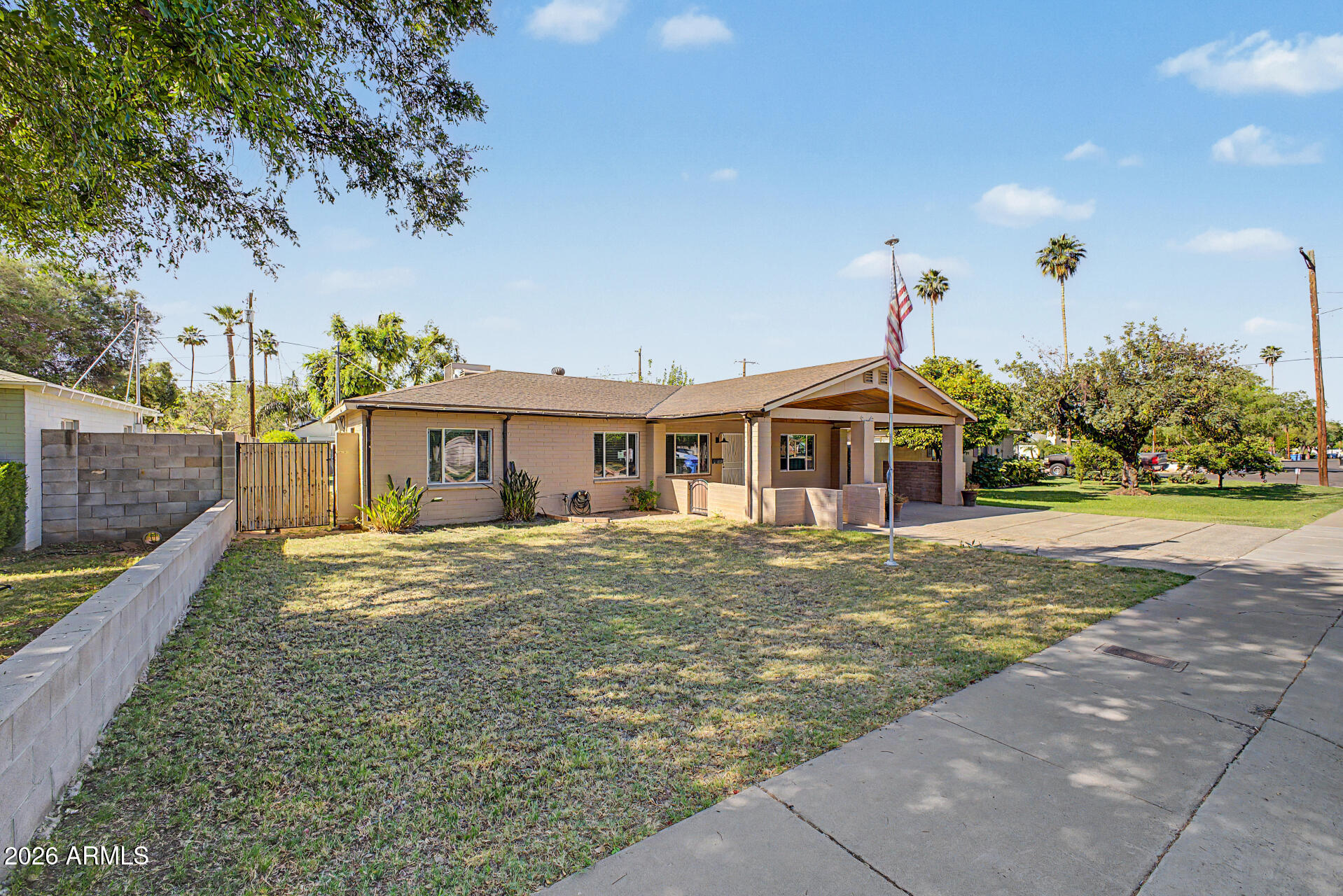3907 East Mulberry Drive Phoenix, AZ 85018 - Photo 2 of 48 a front view of a house with a yard
