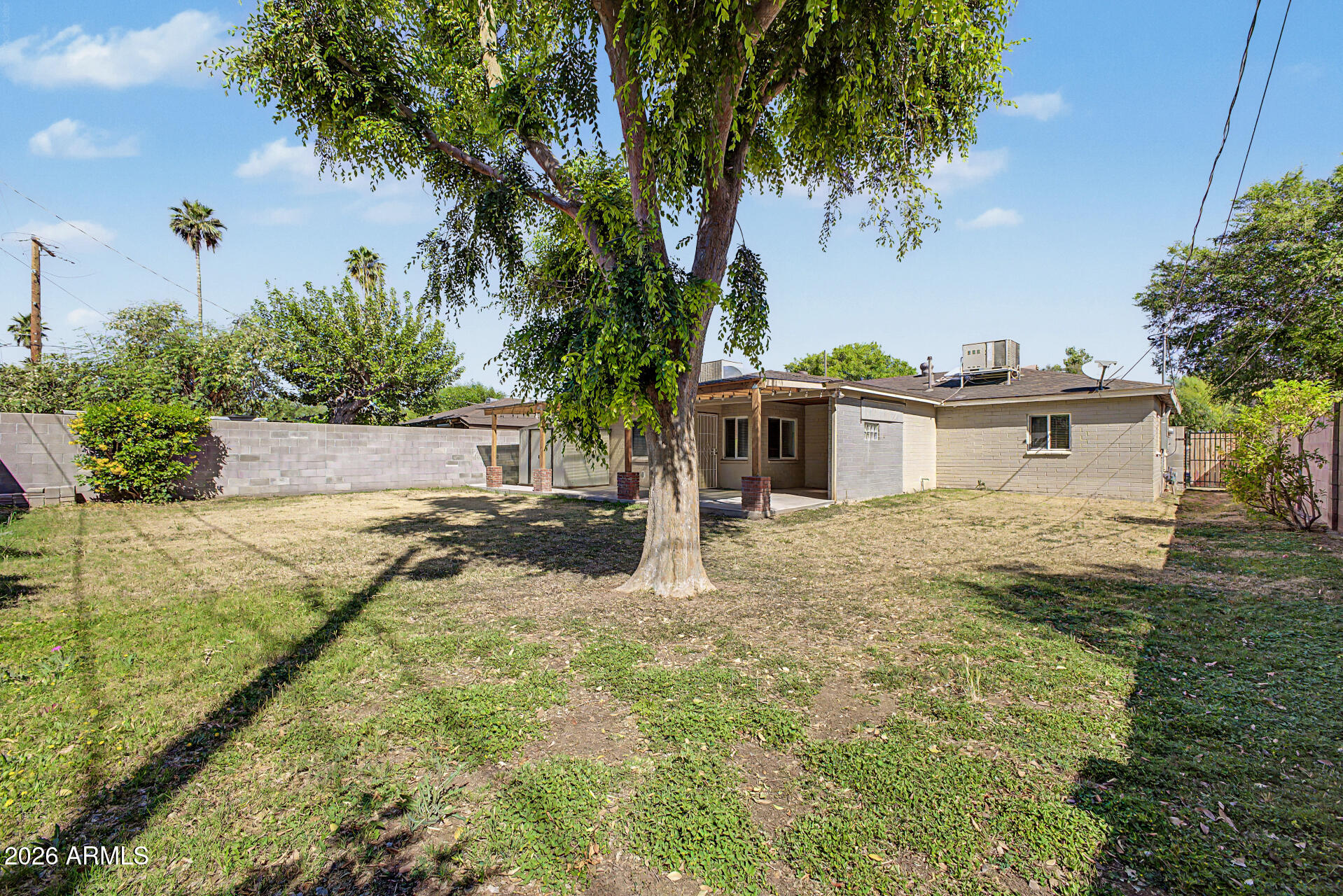3907 East Mulberry Drive Phoenix, AZ 85018 - Photo 29 of 48 a view of a house with a yard