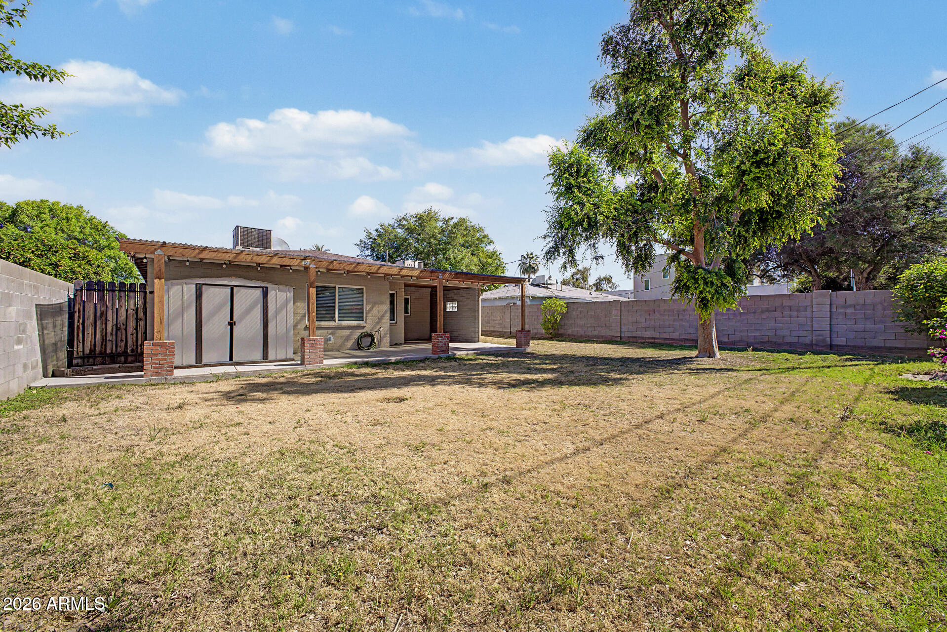 3907 East Mulberry Drive Phoenix, AZ 85018 - Photo 30 of 48 a front view of a house with a yard