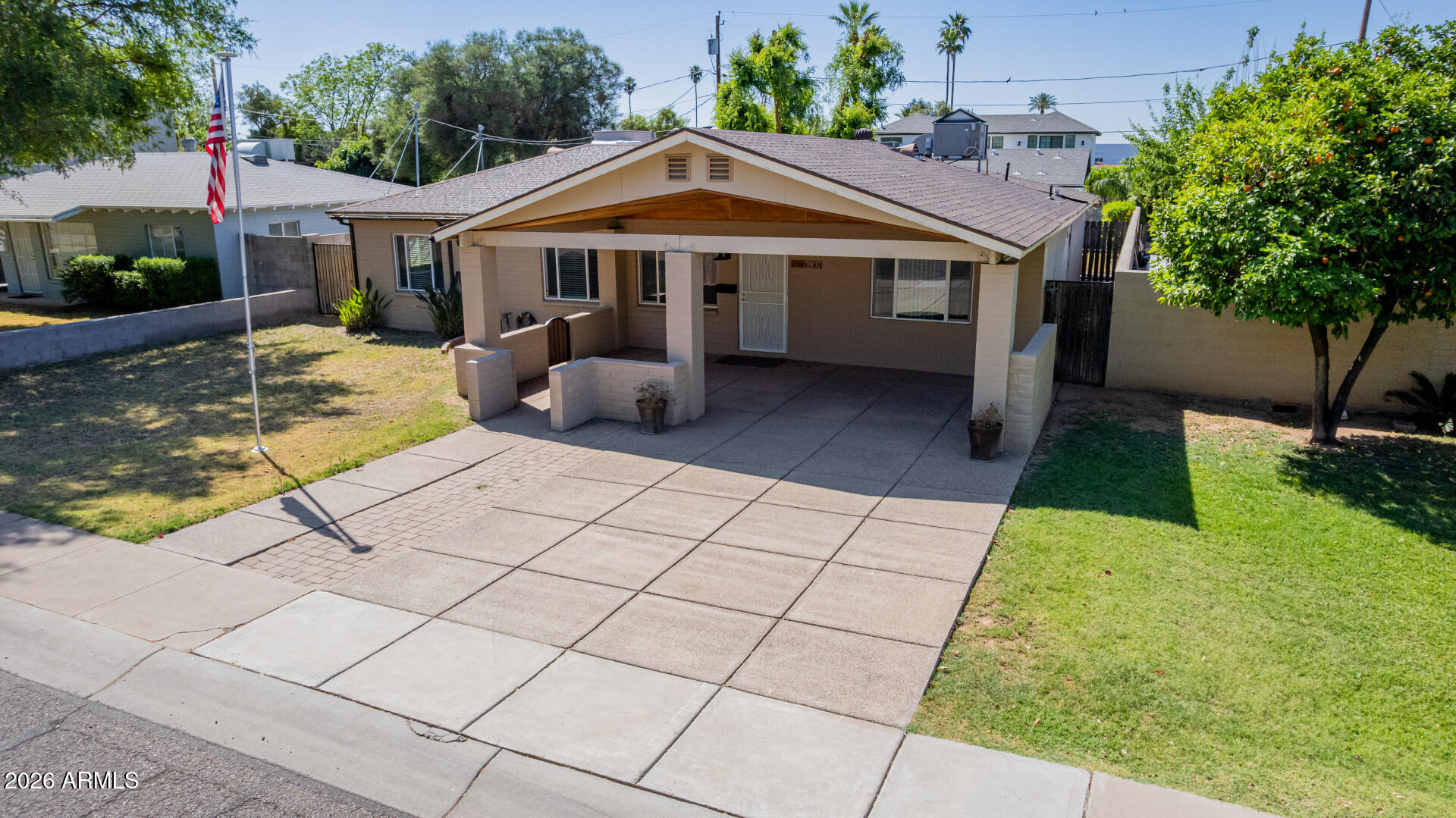 3907 East Mulberry Drive Phoenix, AZ 85018 - Photo 33 of 48 a front view of a house with garden