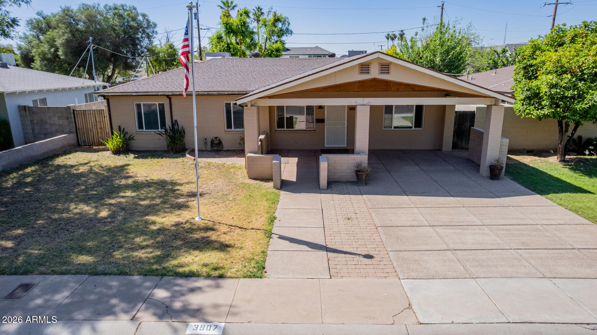 3907 East Mulberry Drive Phoenix, AZ 85018 - Photo 34 of 48 a front view of a house with garden