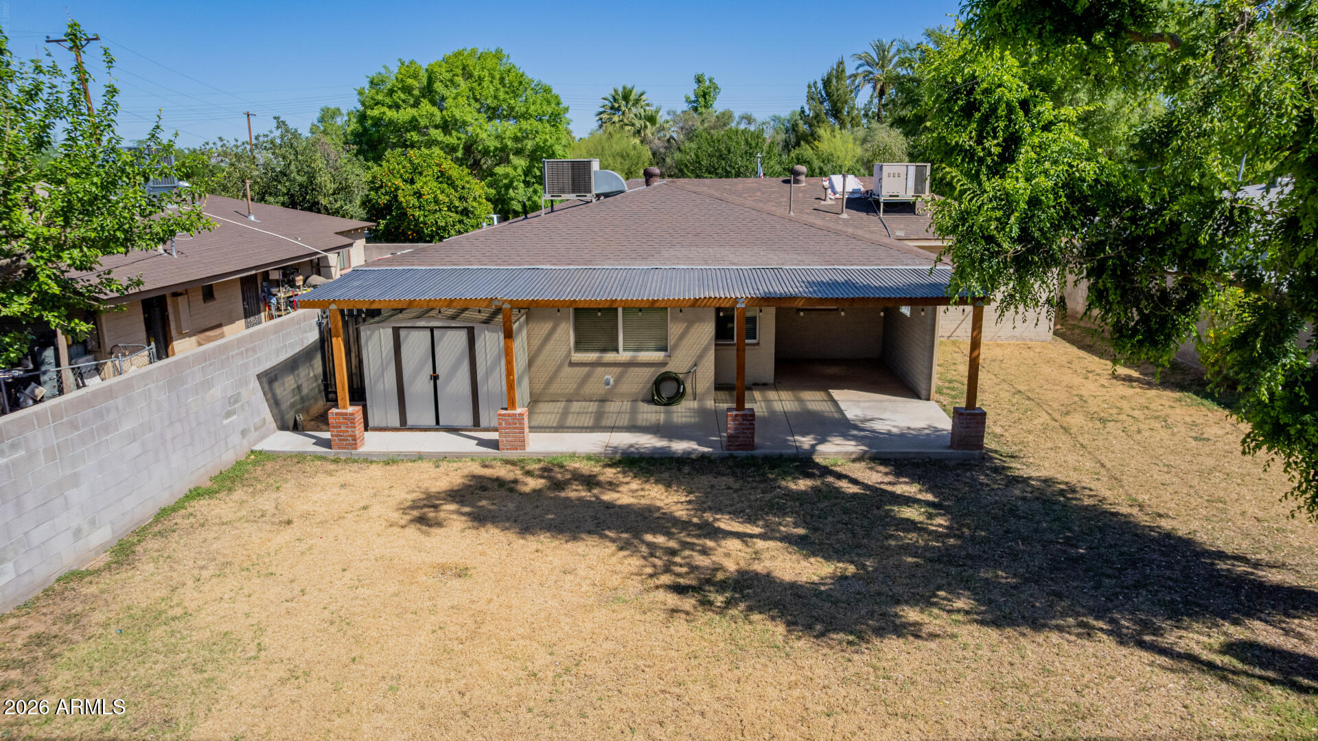 3907 East Mulberry Drive Phoenix, AZ 85018 - Photo 36 of 48 a view of a house with a yard