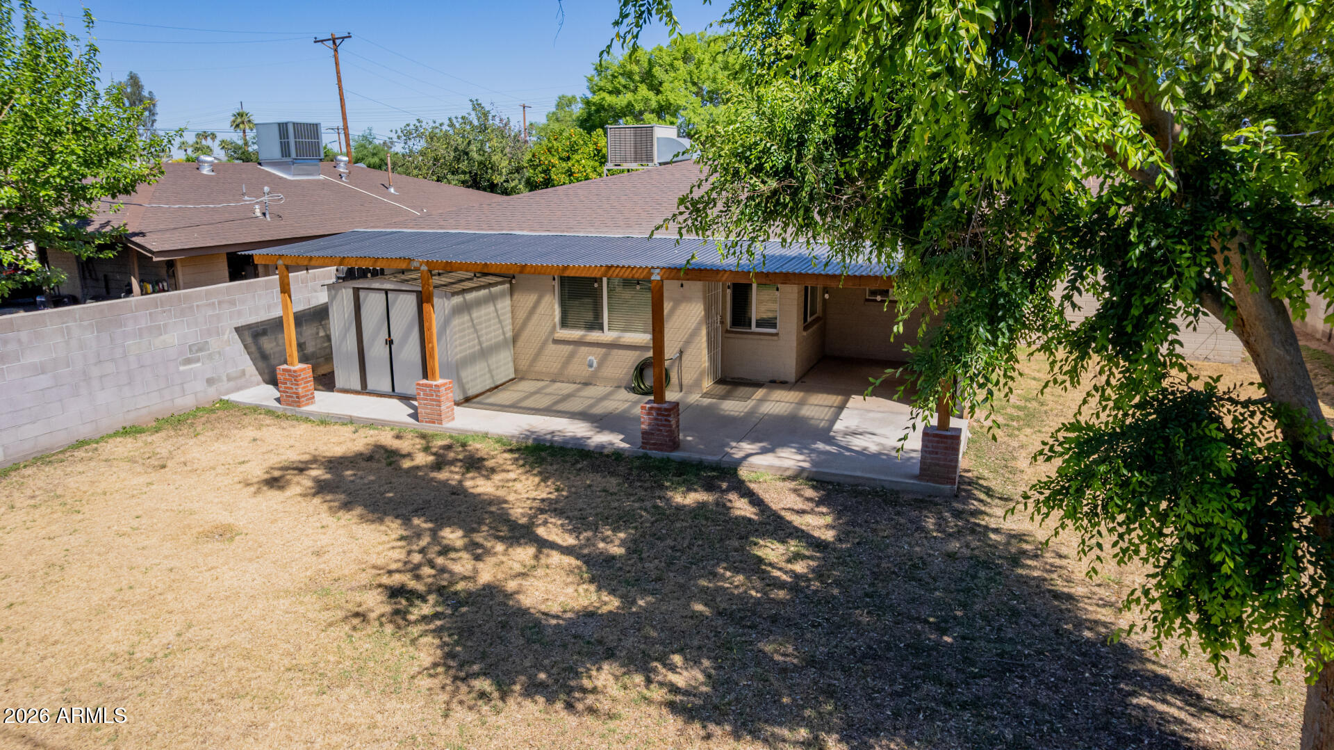 3907 East Mulberry Drive Phoenix, AZ 85018 - Photo 39 of 48 a view of a house with a yard