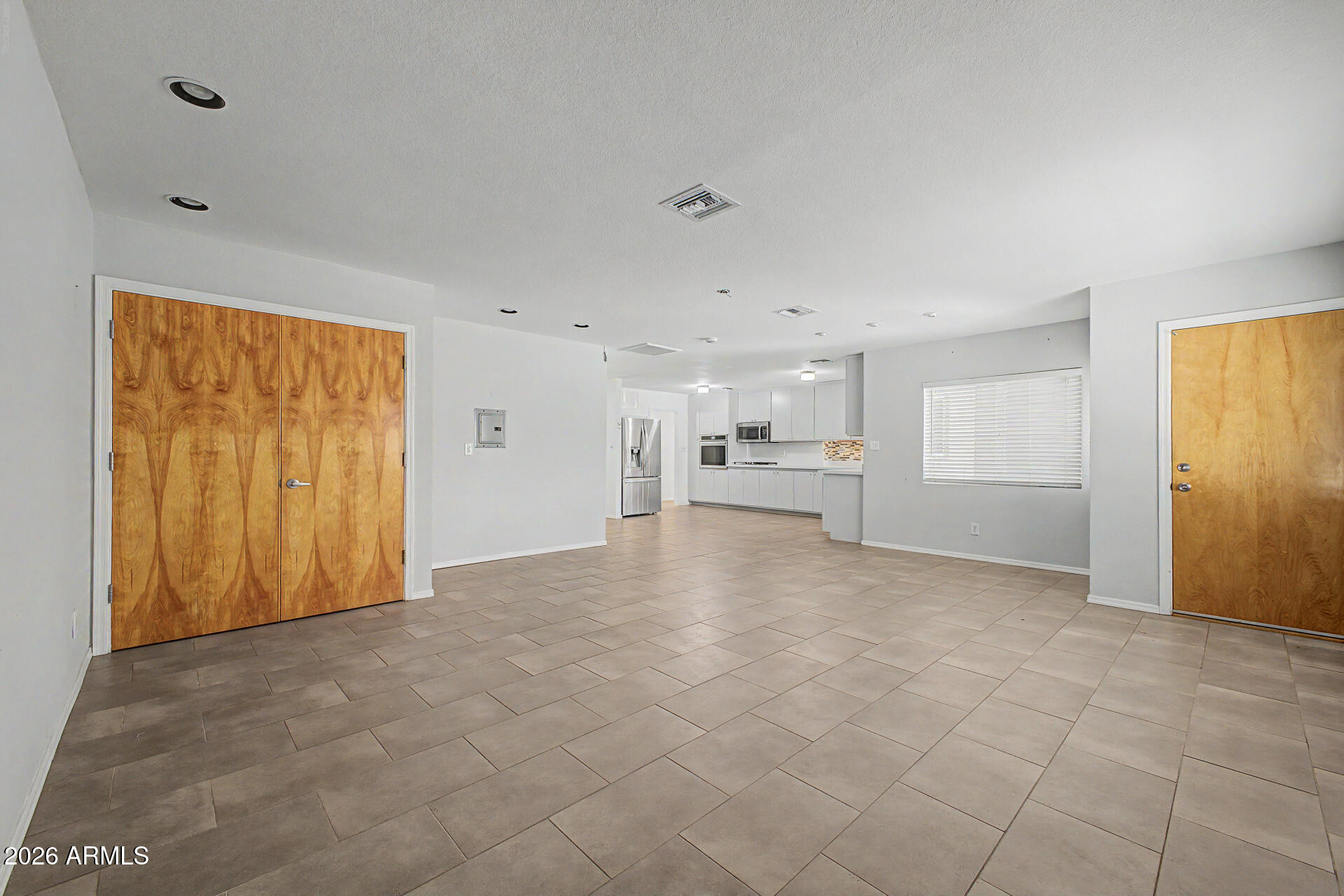 3907 East Mulberry Drive Phoenix, AZ 85018 - Photo 6 of 48 a view of a livingroom with an empty space