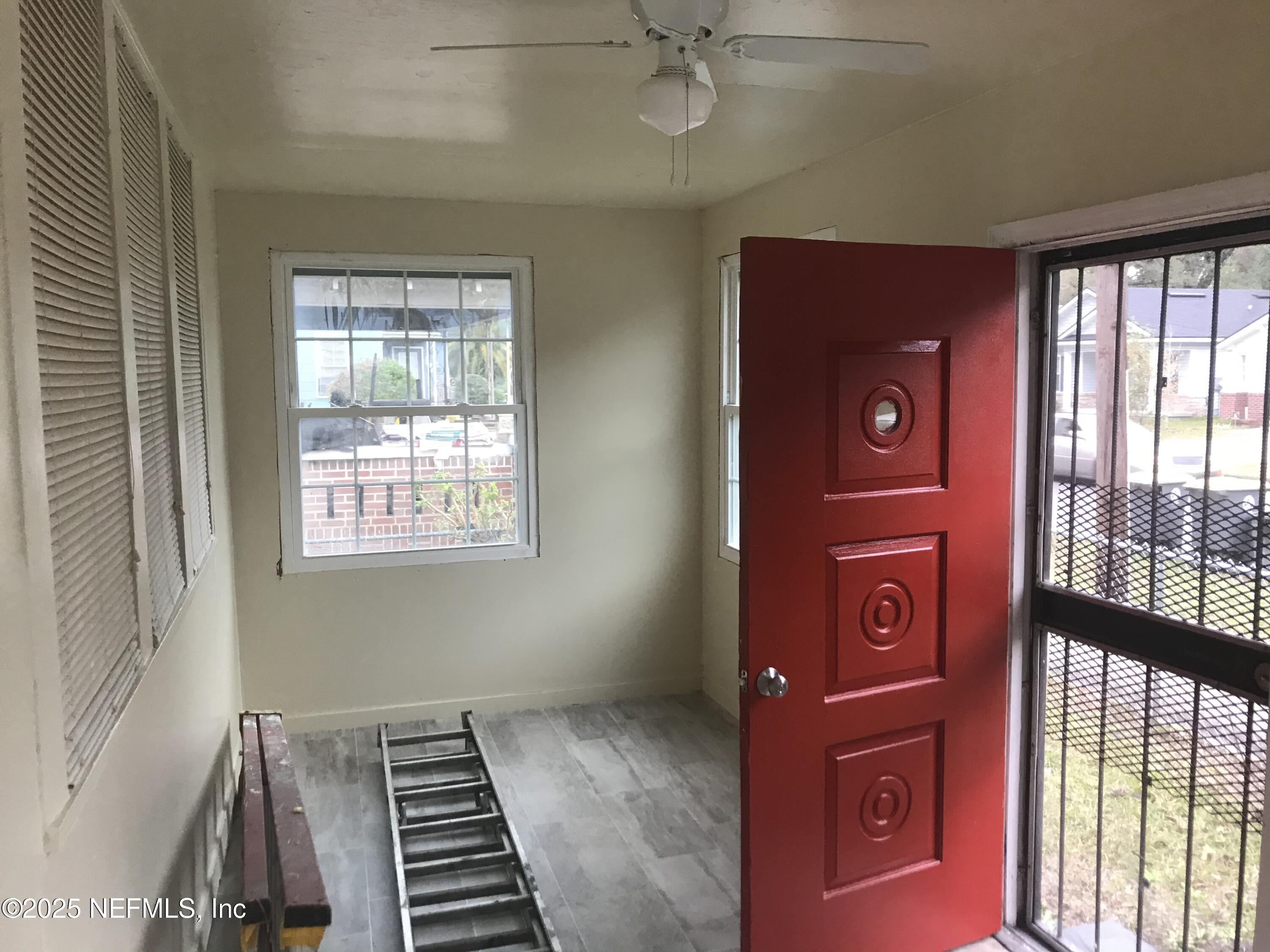 1322 Steele Street Jacksonville, FL 32209 - Photo 3 of 14 a view of an empty room with a window